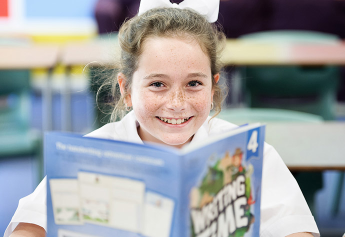 Student with Writing Time Book